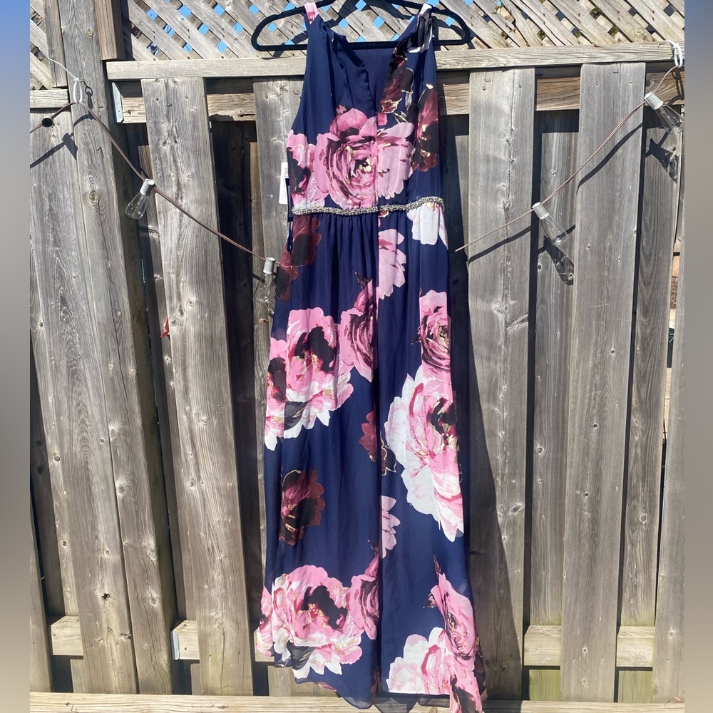 Size 12. Nancy blue with bright floral details and beaded belt